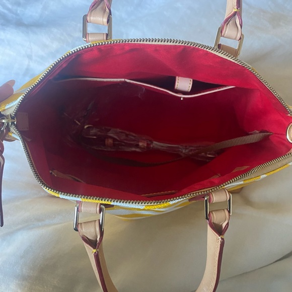 Dooney and Burke polka dot purse - Picture 3 of 3